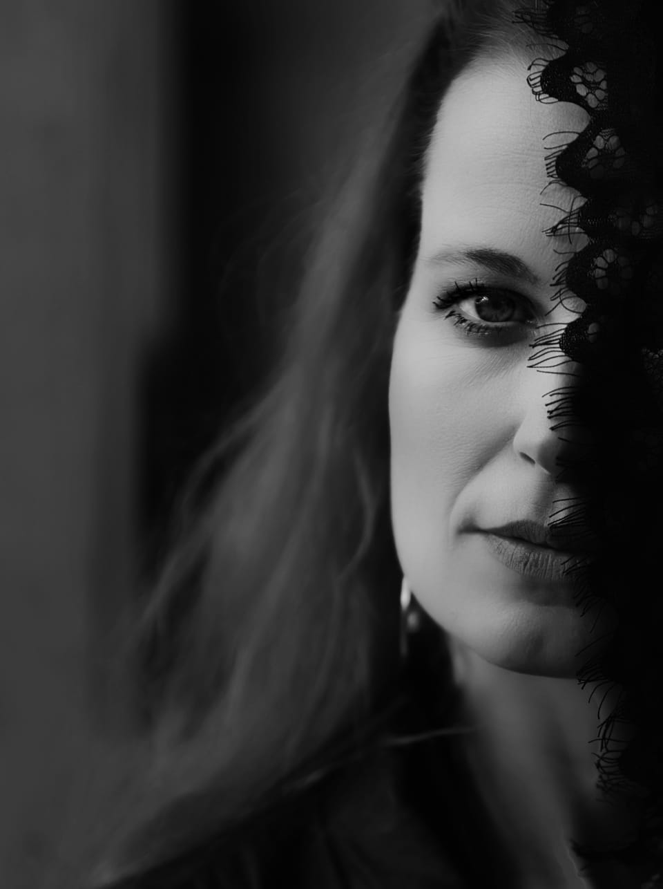 Half the face in soft light, the other half left in shadow
